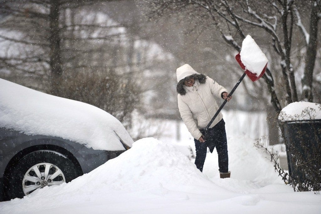 Woman Shoveling