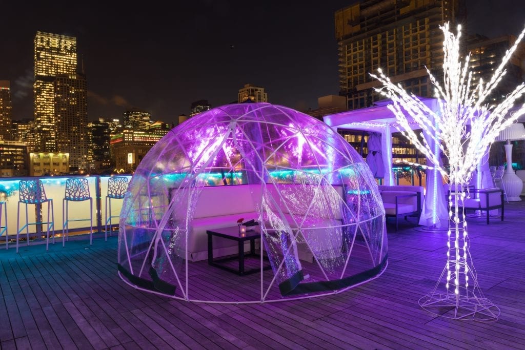 The Godfrey's Rooftop Suits Up With Transparent Igloo Lounges