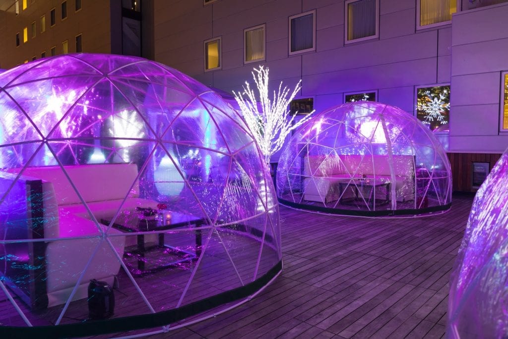 The Godfrey's Rooftop Suits Up With Transparent Igloo Lounges