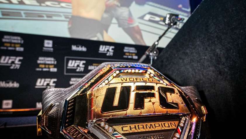 Chicago UFC Fighters post featured image showing the UFC championship belt