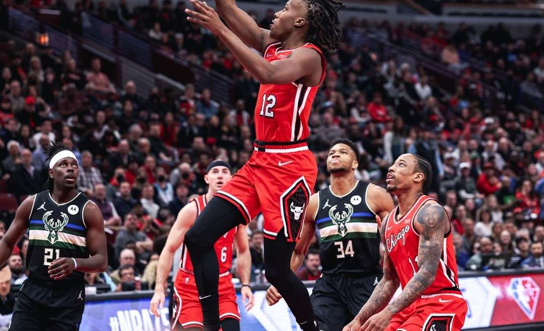 Chicago Bulls Playoffs article featured image of Ayo Dosunmu scoring a basket.