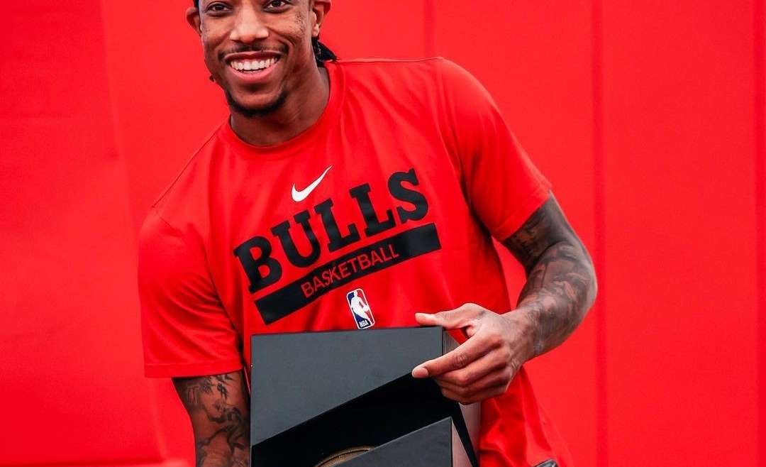 2022 Chicago Sports Gift Guide featured image of DeMar DeRozan with his 20,000 point milestone award.