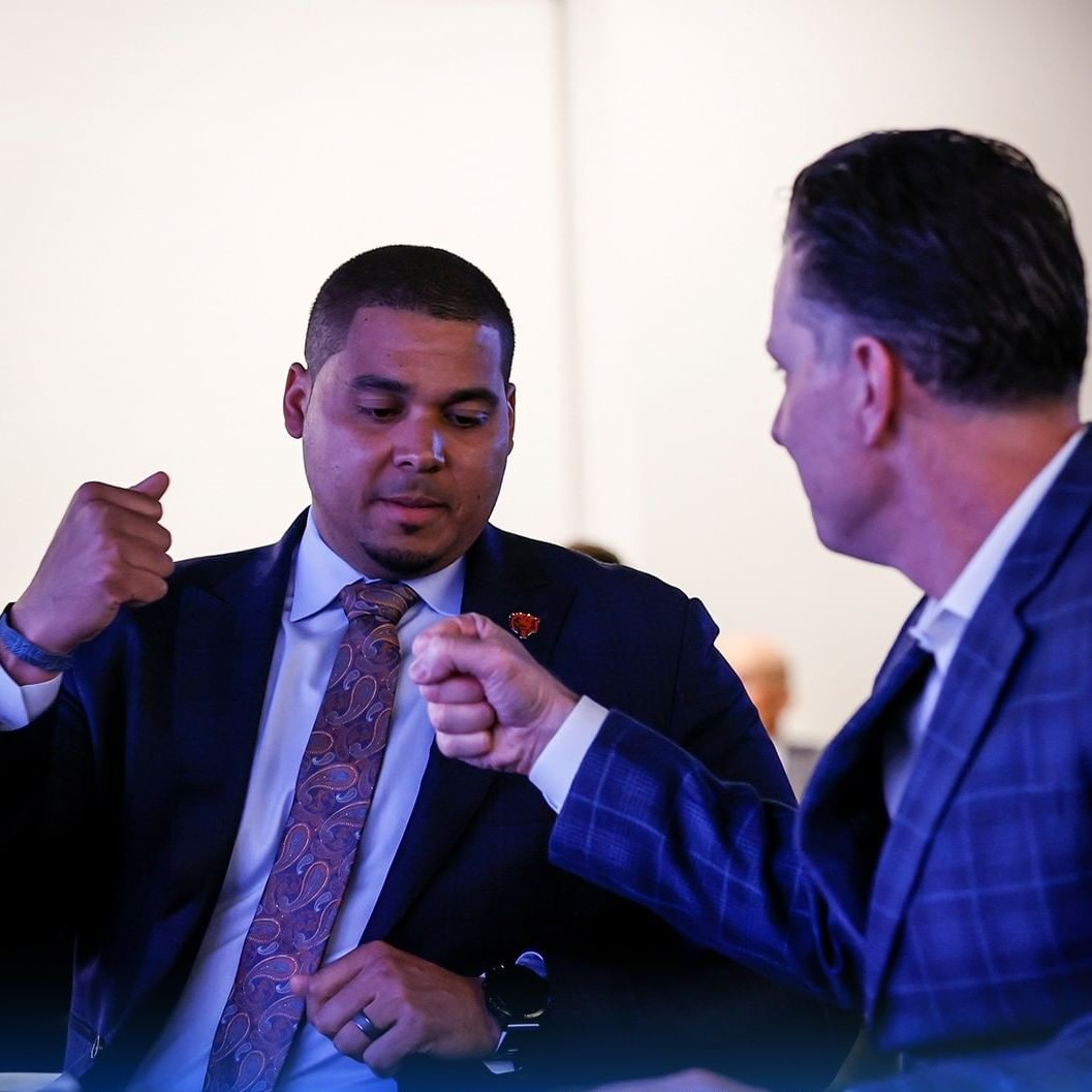 Chicago Bears general manager, Ryan Poles, celebrating with head coach, Matt Eberflus, during their first Bears draft in 2022.