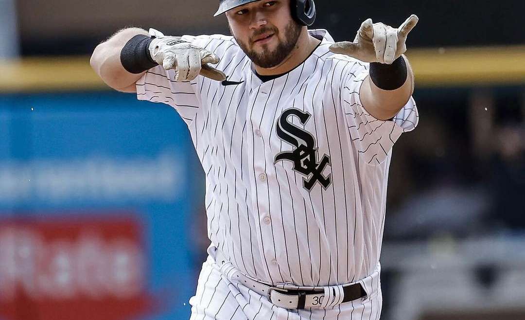 Jake Burger celebrating during a game in the 2023 Chicago White Sox season.