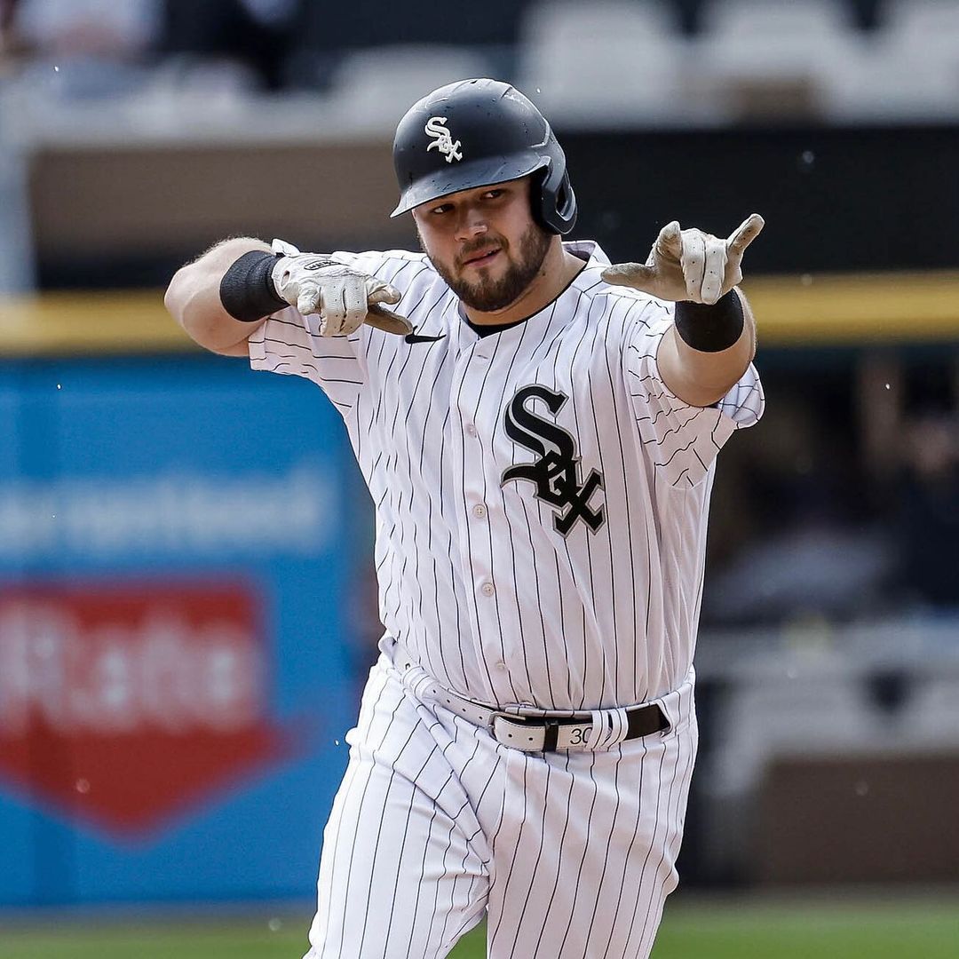 Jake Burger celebrating during a game in the 2023 Chicago White Sox season.