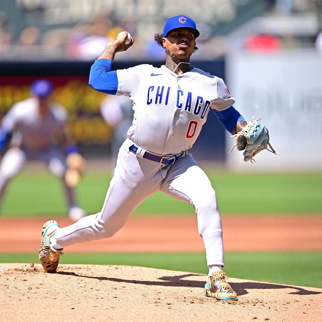 Chicago Cubs pitcher Marcus Stroman mid-windup.