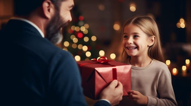 Dad giving gift to daughter