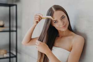 Girl Washing her hair with a hair mask