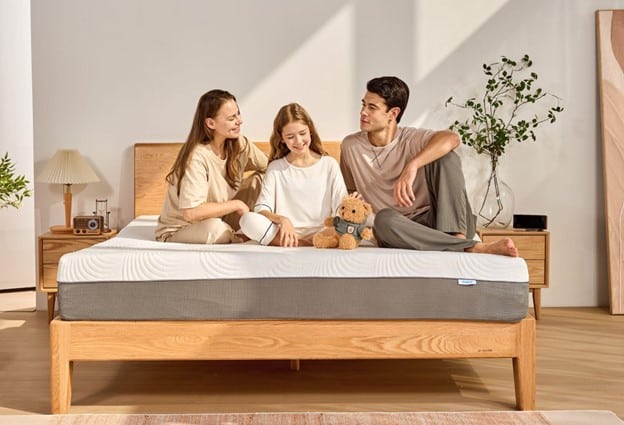 family on bed