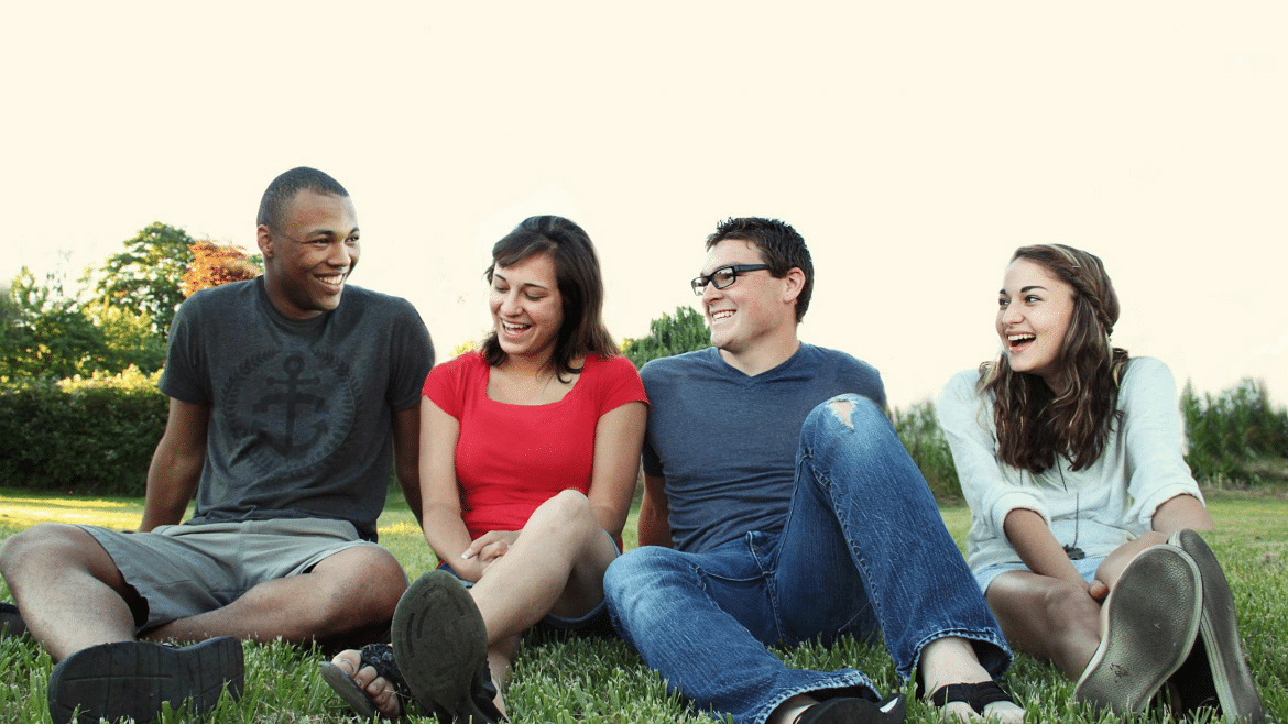 Four Friends sitting on the ground