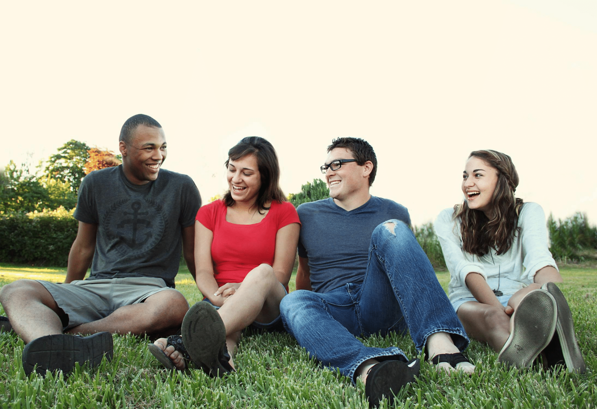 Four Friends sitting on the ground