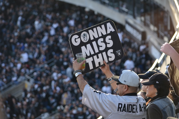 fans holding sign "gonna miss this"