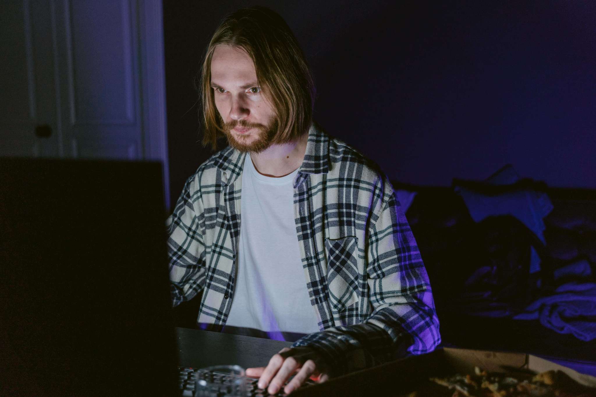 Man browsing on laptop