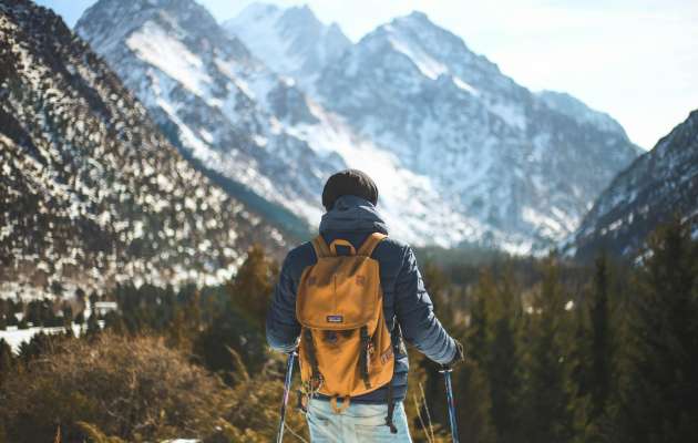 Hiker in front of mountains