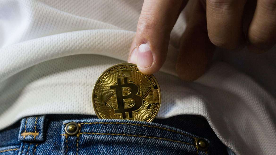 Bitcoin in the pocket of jeans