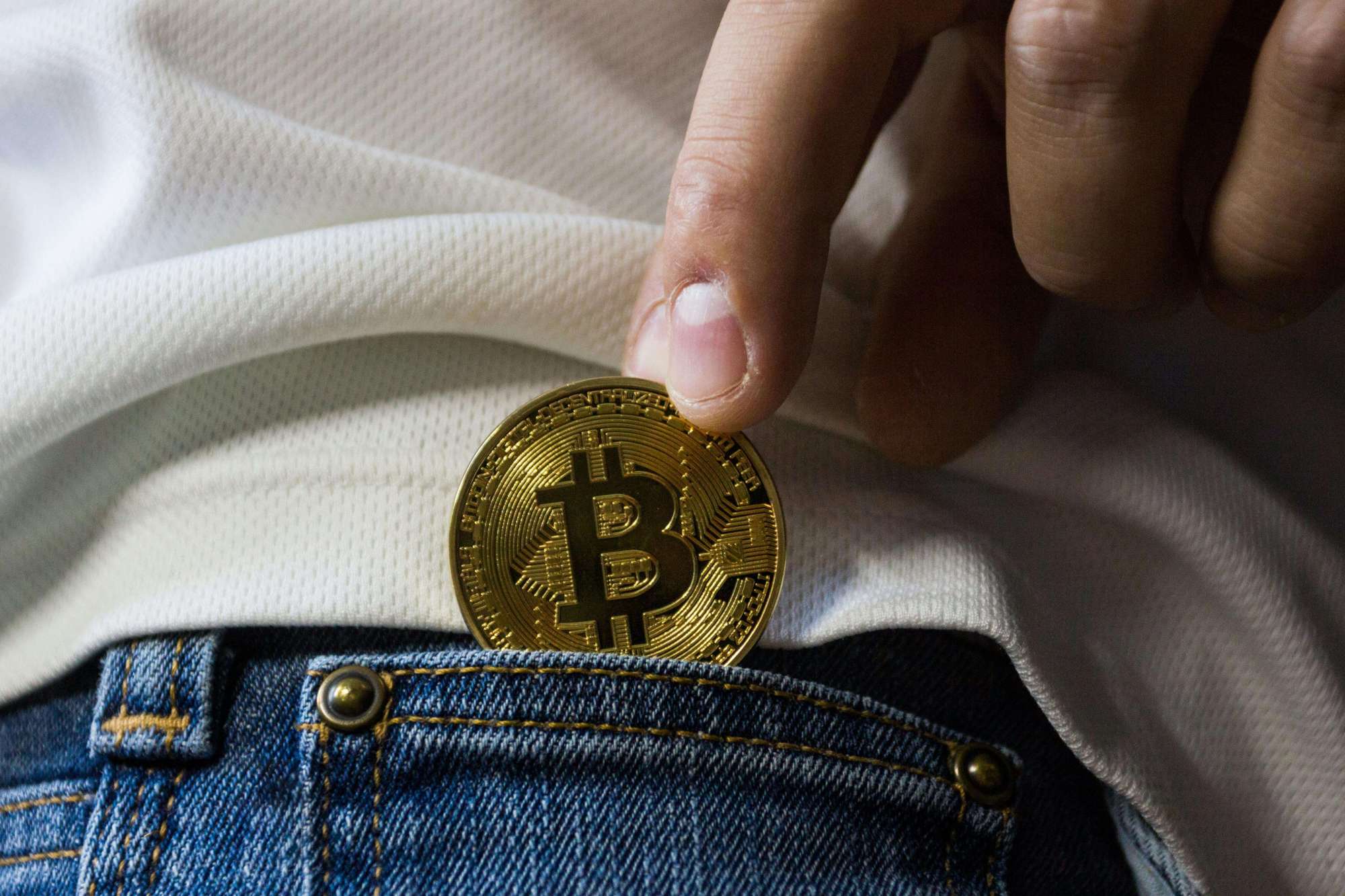 Bitcoin in the pocket of jeans