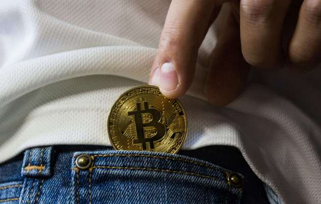 Bitcoin in the pocket of jeans