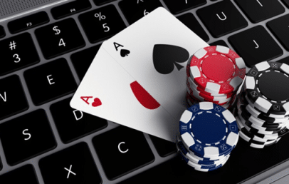 Poker Chips and Cards on laptop keyboard