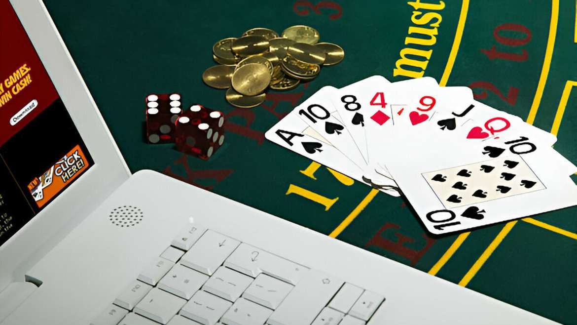 Poker cards and Laptop on table
