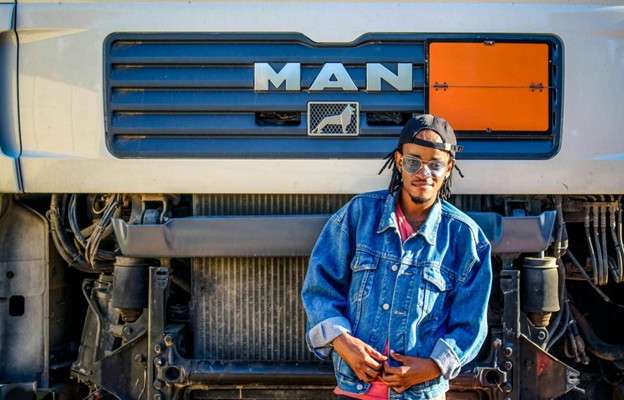 Truck Driver infront of a Truck