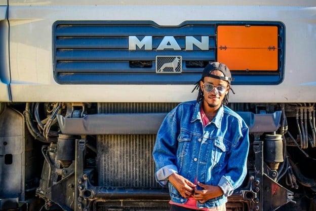 Truck Driver infront of a Truck