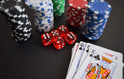 Poker Chips and Cards on the table with dices
