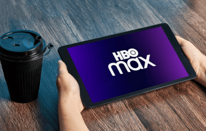 A tablet with the logo of HBO Max on the screen