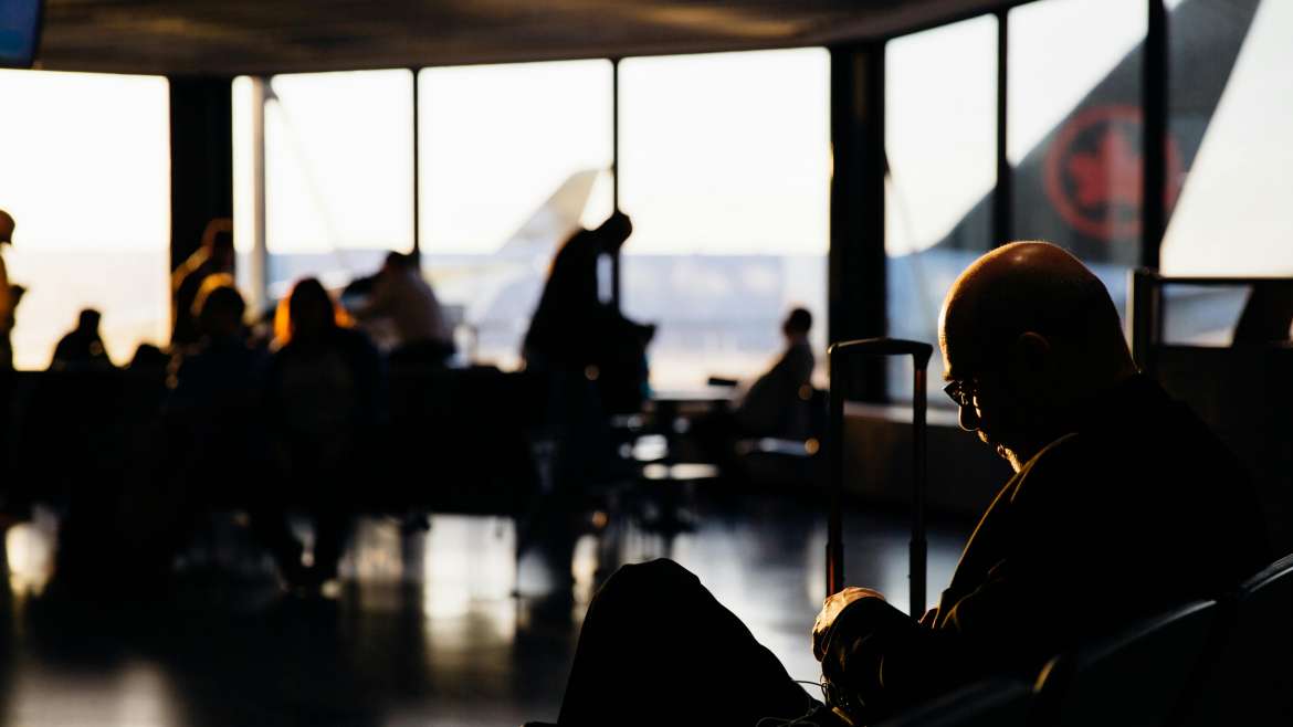 sitting in airport lounge