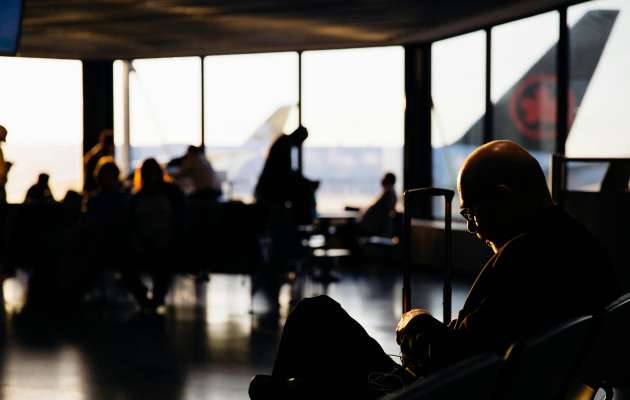 sitting in airport lounge