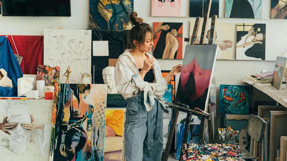 Woman looking at painting